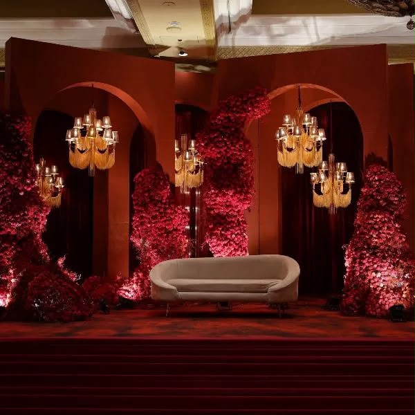 Maroon stage with ivory seating